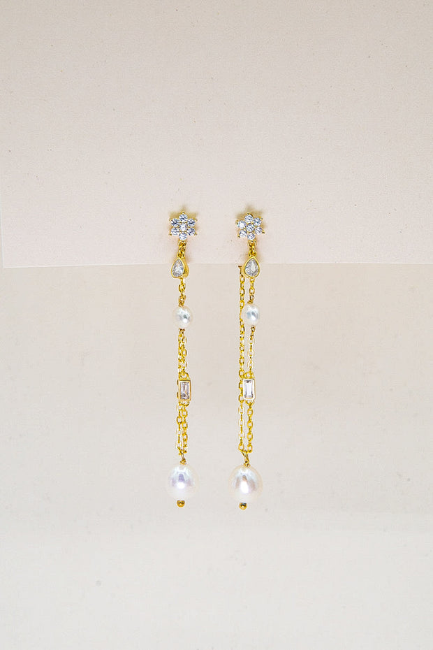AMBRA - Orecchini lunghi con zirconi e perle