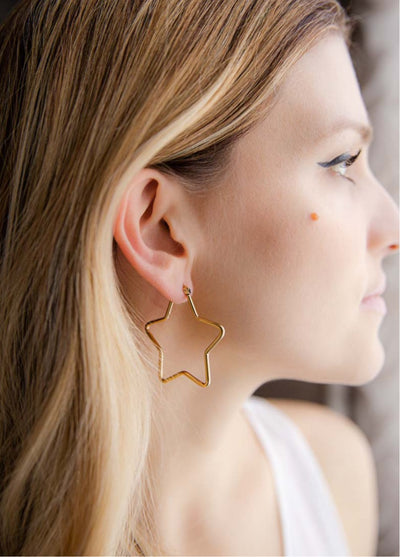 orecchini a forma di stella - oro
